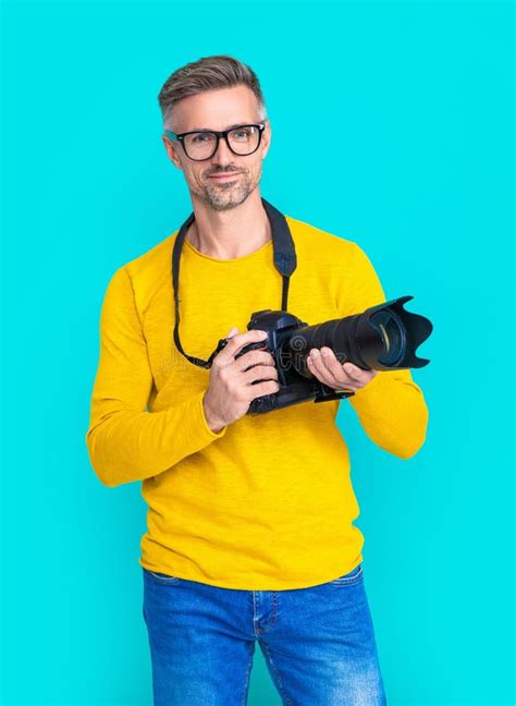 Happy Man Photographer With Camera Isolated On Blue Man Photographer