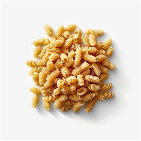 Premium Photo Raw Pasta Fusilli Isolated On White Background