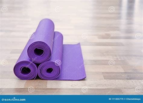 Purple Yoga Mats On Wooden Floor Stock Image Image Of Background