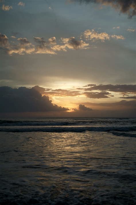 Photo of Ocean Waves Near Seashore during Sunset · Free Stock Photo