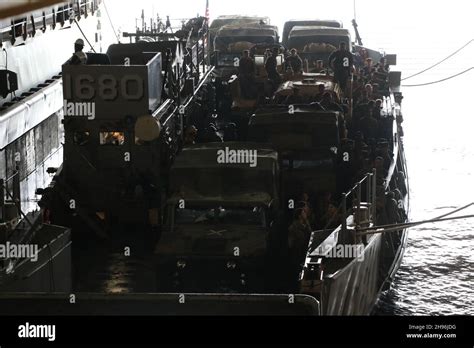 A Landing Craft Utility Enters The Well Deck Of Amphibious Landing