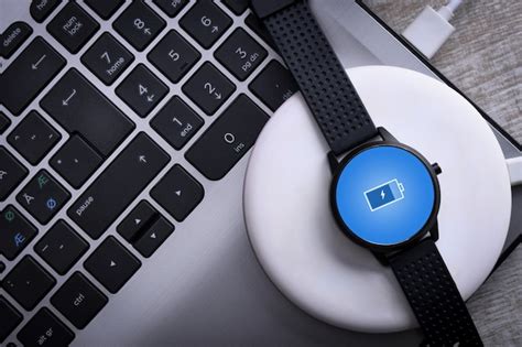 Premium Photo | Smart watch on wireless charging with on-screen ...