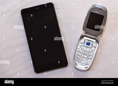 Two cell phones with different development stages - optional Stock Photo - Alamy