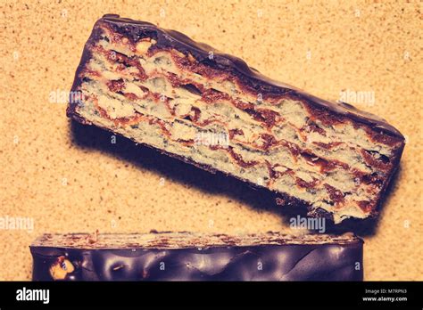 A Cut Wafer Bar In Chocolate Stock Photo Alamy