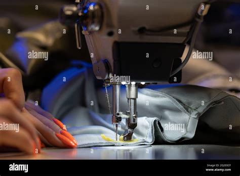 Seamstress Work On Sewing Machine Closeup Woman Fashion Designer