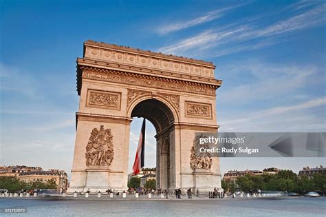 Arc De Triomphe And French Flag High-Res Stock Photo - Getty Images