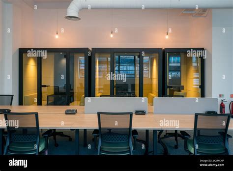 A Contemporary Office Space Features Individual Workstations With