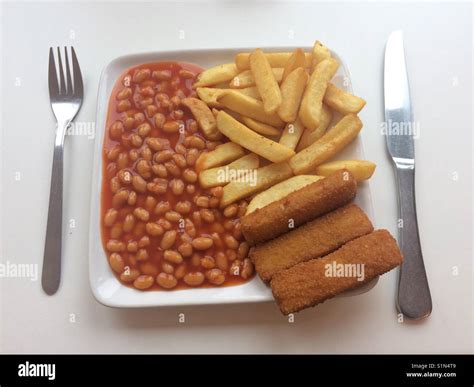 Fish fingers, chips and beans Stock Photo - Alamy