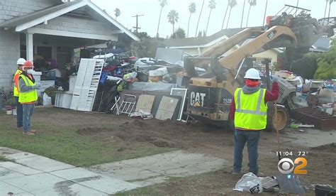 Crews Arrive With Heavy Machinery To Clear Hoarder Home In Koreatown