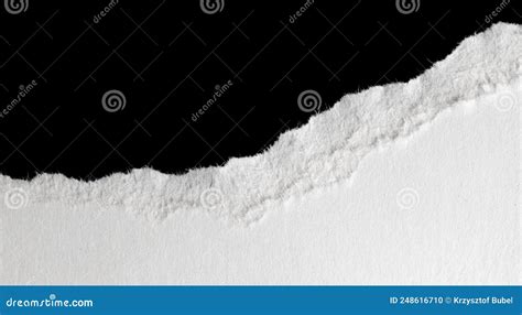 A White Piece Of Paper On A Black Isolated Background Stock Photo