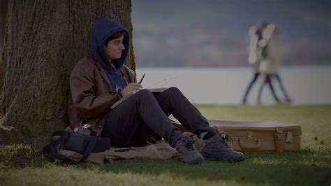 Young Creative Male Artist Drawing a Sketch Outside in the Park ...