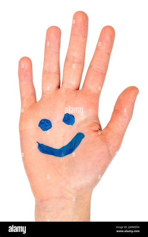 Blue smiling face drawn on child palm Stock Photo - Alamy