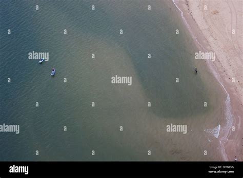 Aerial View Of People Early In The Morning On Beach In Port Melbourne