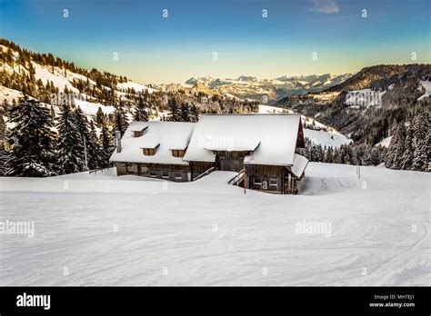 Farmhouse in Snowy Mountains Stock Photo - Alamy