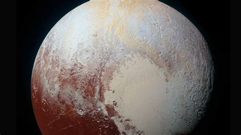 NASA: Pluto has mountains, plains and signs of change