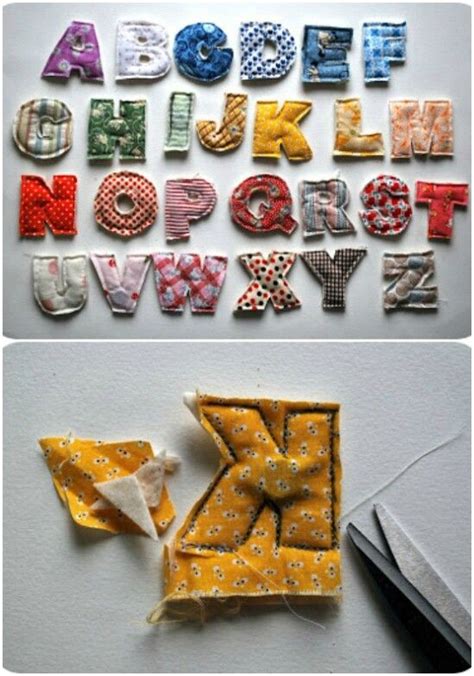 The Letters Are Made Out Of Fabric And Some Type Of Sewing Material