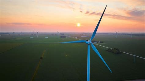 Premium Photo Image Of Sunrise Of Orange And Pink With Wind Turbines