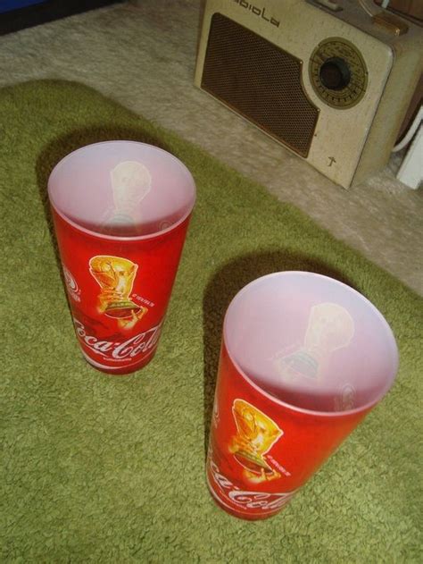 Hologram Coca Cola 2 Becher FiFA WM 2006 Germany TM FiFA 74 Kaufen