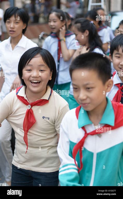 chinese school children on the street of shanghai china Stock Photo - Alamy