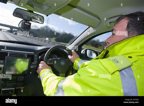 Interior view of a police patrol car on the M1 motorway in Bedfordshire ...