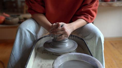 Female Hands Shaping Clay Pot Working On Pottery Wheel Stock Video