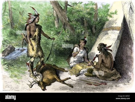 Eastern Woodlands Indian hunter bringing deer to his family forest ...