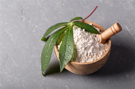 Premium Photo | Manioc flour on grey background