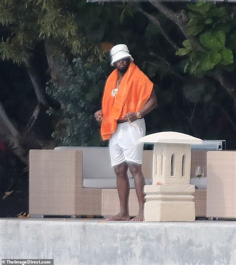 Diddy Steps Out Shirtless For A Smoke And Takes A Stroll Down Waterfront Pier At His 35 Million