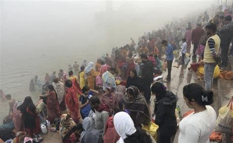 Varanasi Devotees Take A Holy Dip In The Ganges On The Occasion Of