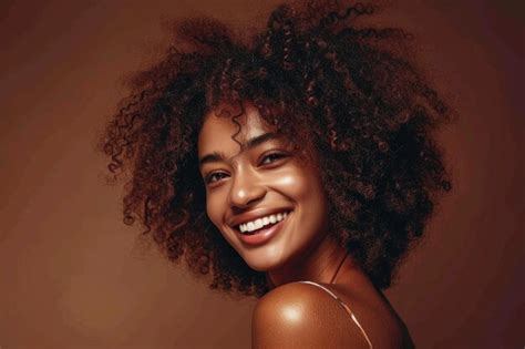 Premium Photo | Smiling woman with afro curls in fashion portrait