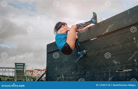 Participant In Obstacle Course Climbing Wall Stock Photo Image Of