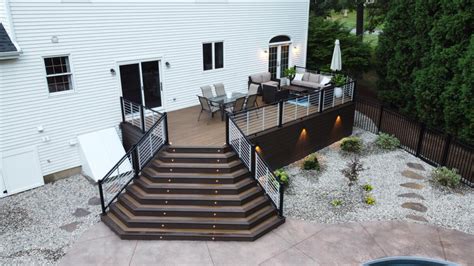 Maple Leaf Carpentry Builds A Custom Trex Deck With A Dramatic Stairway Kelly Fradet