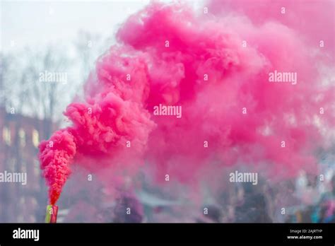 festival of colored smoke pink smoke bomb Stock Photo - Alamy