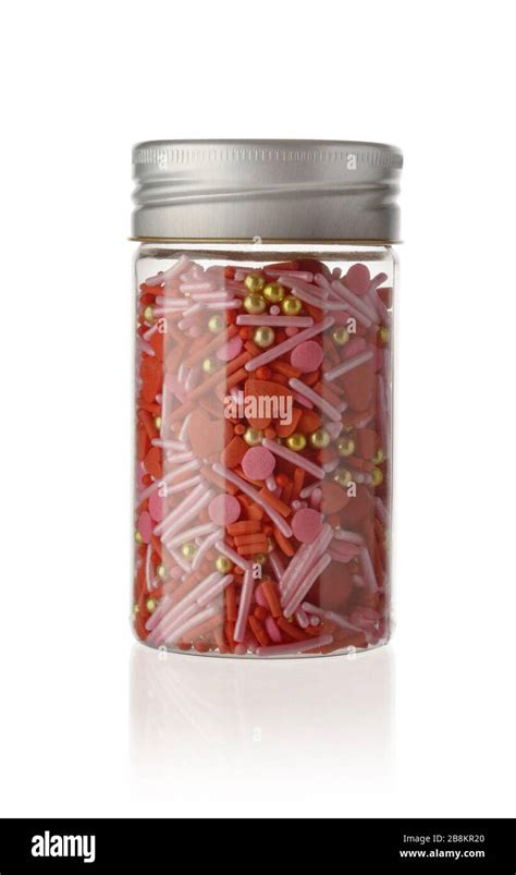 full color topping sprinkle  glass bottle  isolated white