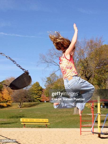 530 Kid Jumping From Swing Stock Photos, High-Res Pictures, and Images ...