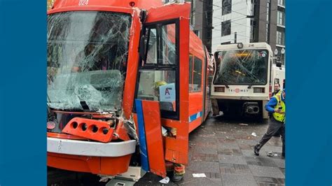 MAX and Streetcar crash in NE Portland, derailing cars, pining driver : r/PortlandOregon