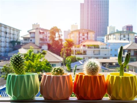 Premium Photo Colorful Painted Geometric Concrete Planters With