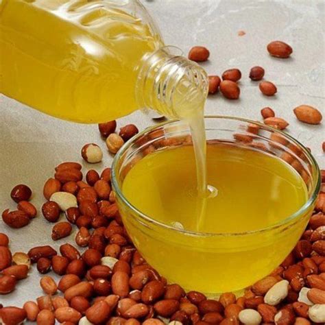 Yellow Colour Thick Cold Pressed Groundnut Oil With Strong Groundnut