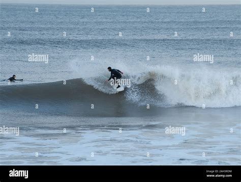 Surfing at Oxwich Bay, Gower Stock Photo - Alamy