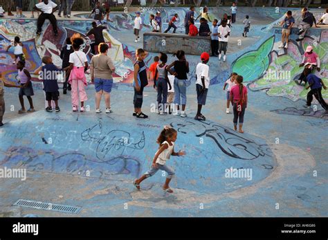 Children playing in urban skate park Stock Photo - Alamy