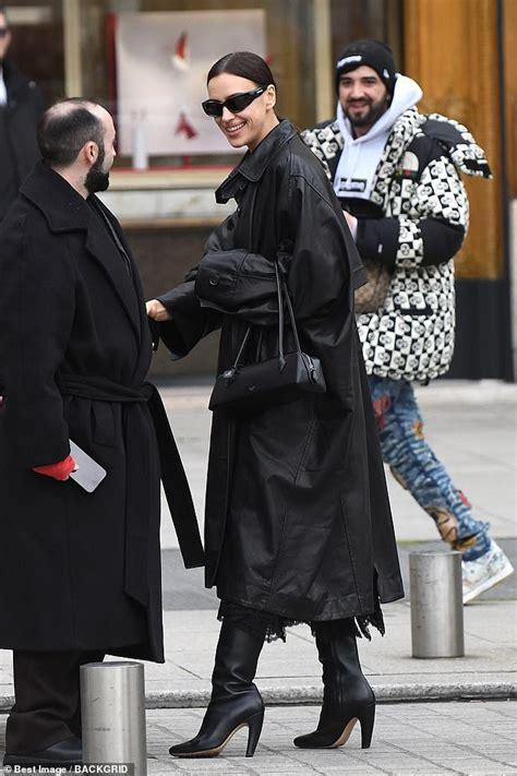 Irina Shayk Cuts A Stylish Figure In A Black Leather Trench Coat And