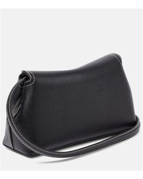 Tot Me T Lock Small Leather Clutch In Black Lyst