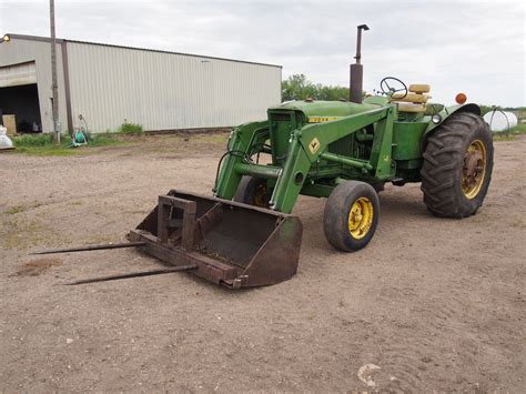 John Deere Diesel 3020 with JD 148 Loader