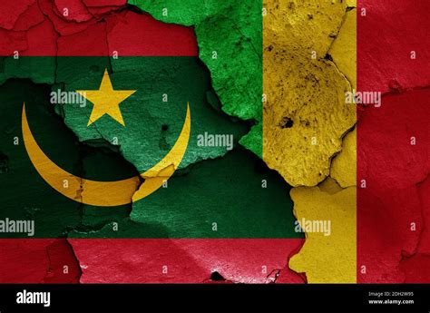 Flags Of Mauritania And Mali Painted On Cracked Wall Stock Photo Alamy