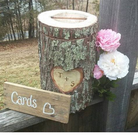 A Wooden Sign That Says Cards And Hearts Next To A Tree Stump With