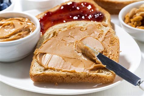 Toast with Peanut Butter and Jam Stock Photo - Image of blueberries ...