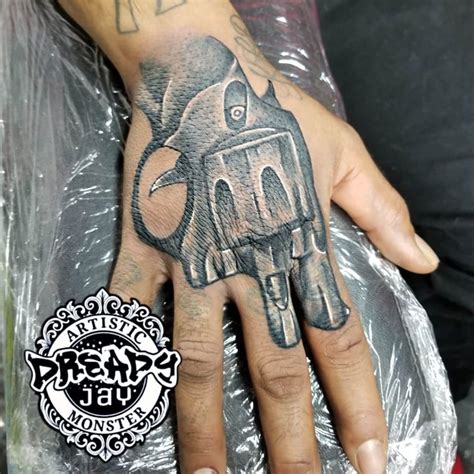 Top 147 Revolver Hand Tattoo