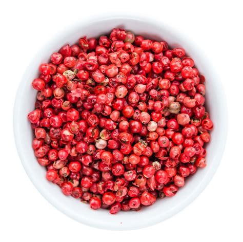 Premium Photo Pink Peppercorns Isolated On White Background