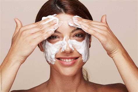 Beauty Closeups Face Washing Woman Washing Her Face With Soap Studio