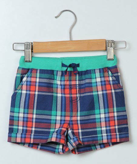 These Casual Shorts Feature A Classic Plaid Print And A Snug Fitting